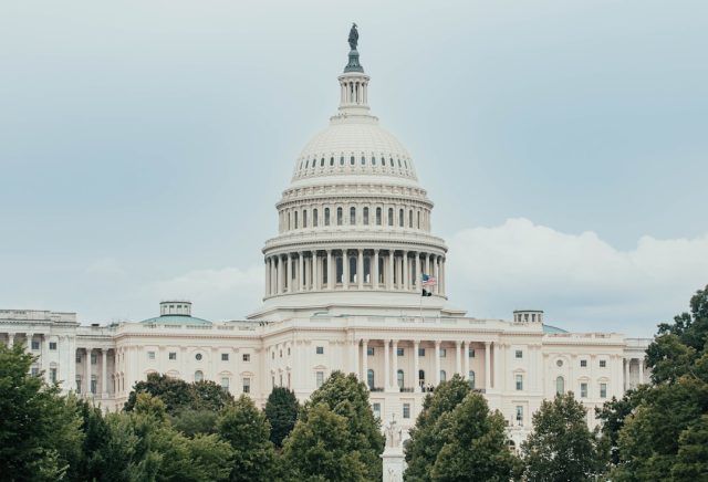 1963 White House Memo Reveals Uncertainty on Alien Contact Protocol A declassified 1963 government memorandum titled 59_214434_SP 16 sits on a desk, detailing alien contact plans.