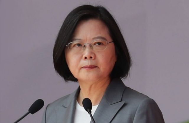 Taiwan President Tsai Ing-wen smiling Taiwan's President Tsai Ing-wen speaking during an interview, asserting Taiwan's sovereignty and democratic status.