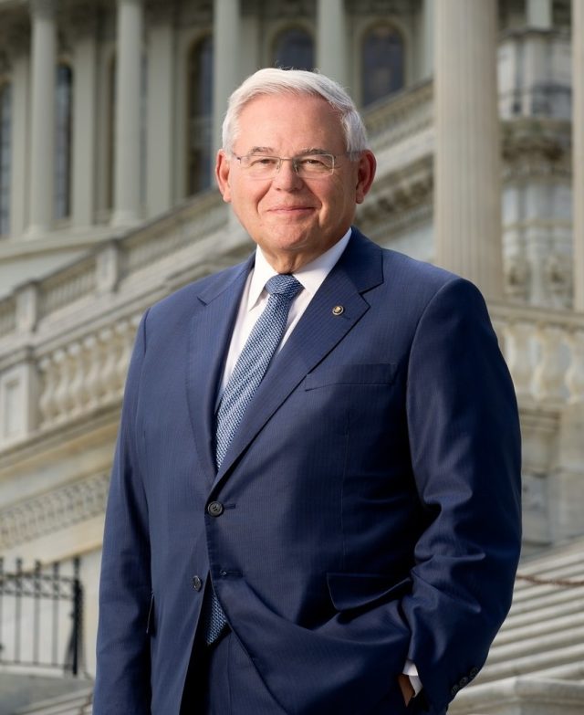 Bob Menendez official portrait photo Bob Menendez speaking at a Senate hearing with a serious expression