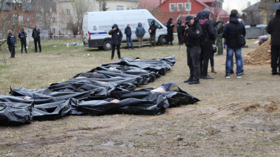 Bucha Massacre Bodies Ukraine Russia Bodies of civilians lie scattered on a street in Bucha, Ukraine, after Russian troops withdrew from the area.