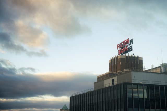 HSBC's LIBOR manipulation affected $350 trillion in derivatives contracts HSBC bank building exterior with financial charts showing LIBOR rate manipulation