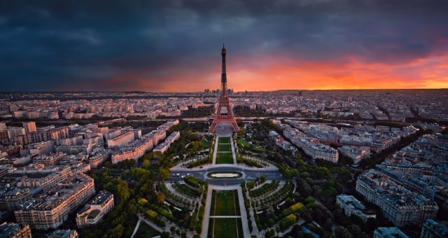 Paris Unveils Seine River Ceremony for 2024 Olympic Games Opening Boats carrying athletes parade along the Seine River past the Eiffel Tower during the 2024 Olympic Games opening ceremony in Paris.