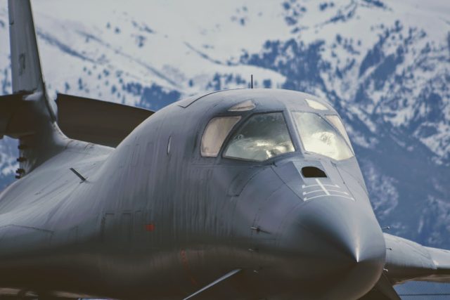 DoD Releases Mission Report of Triangular UAP Over Mediterranean A triangular metallic object glints above Mediterranean clouds as a military operator logs the UAP sighting on a MISREP form.