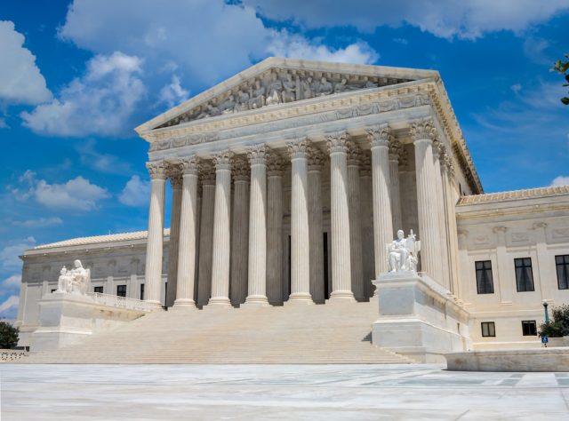 Supreme Court to Hear TikTok Case That Could Ban App by January 19, 2025 Lawyers walk up the Supreme Court steps carrying briefs labeled TikTok v. Garland under a January deadline banner.