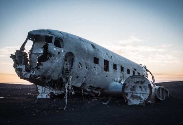 Families of August 27 Crash Victims Receive Official Body Identification Confirmation Investigators in protective suits examine wreckage at a remote crash site in Russia