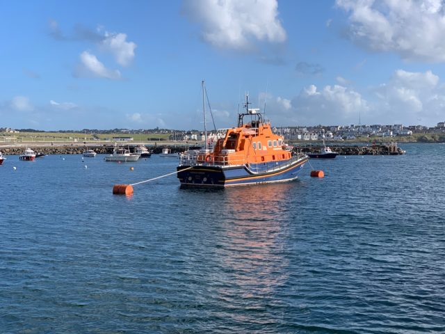 Man's body recovered from Channel after migrant boat distress Emergency responders recover a body from the cold waters of the English Channel near a small overcrowded boat.