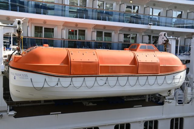 Speedboat Instability Cited in Deadly Capsizing Off Greek Coast A capsized speedboat bobs in choppy Aegean Sea waters near the Greek coast as rescue boats approach survivors.