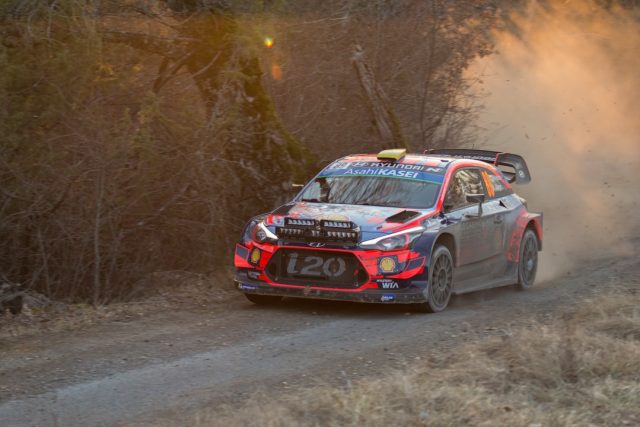 Two Injured, One Dead as Rally Car Strikes Spectators in Argentina A rally car speeds along a dusty dirt road in rural Argentina with spectators standing close to the course without barriers.