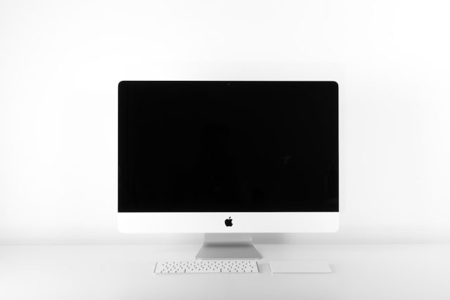 Adobe Firefly Generative AI Tools Now Live in Creative Cloud Plans A graphic designer using Adobe Firefly on a tablet to generate a background image in Creative Cloud.