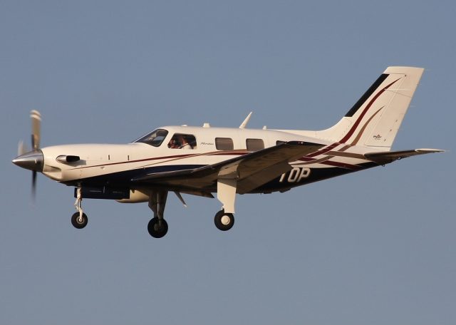 Seven Killed in Piper PA-46 Plane Crash in Rural Brazil Area Wreckage of a Piper PA-46 aircraft scattered across a rural field in Itapeva, Brazil, with emergency responders nearby.
