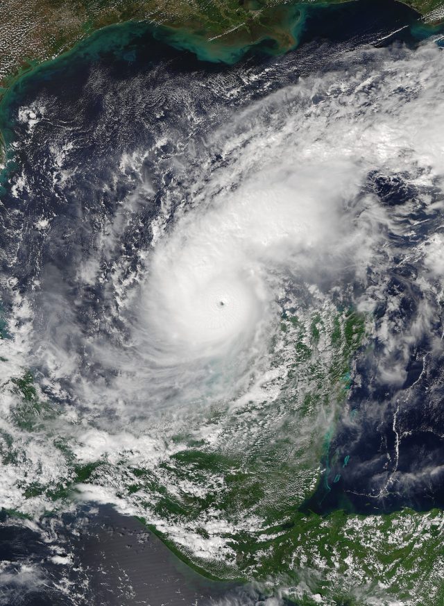 NASA Cancels Europa Clipper Launch Due to Hurricane Milton Impact NASA’s Falcon Heavy rocket stands on the pad under dark hurricane clouds at Kennedy Space Center