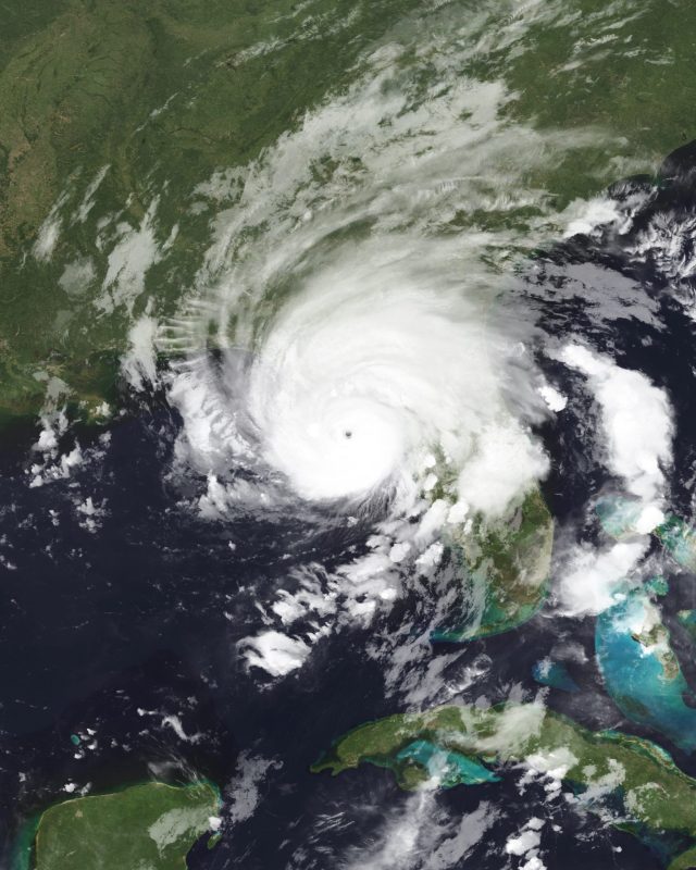 Hurricane Idalia Makes Landfall in Florida as Category 3 Storm Satellite image of Hurricane Idalia approaching the Florida coastline with swirling clouds and heavy rain bands.