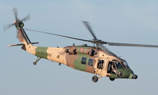 Military Helicopter Crash in Mexico's Durango State Kills Three People Wreckage of a military helicopter scattered across a rugged terrain in Durango, Mexico, after the fatal crash.