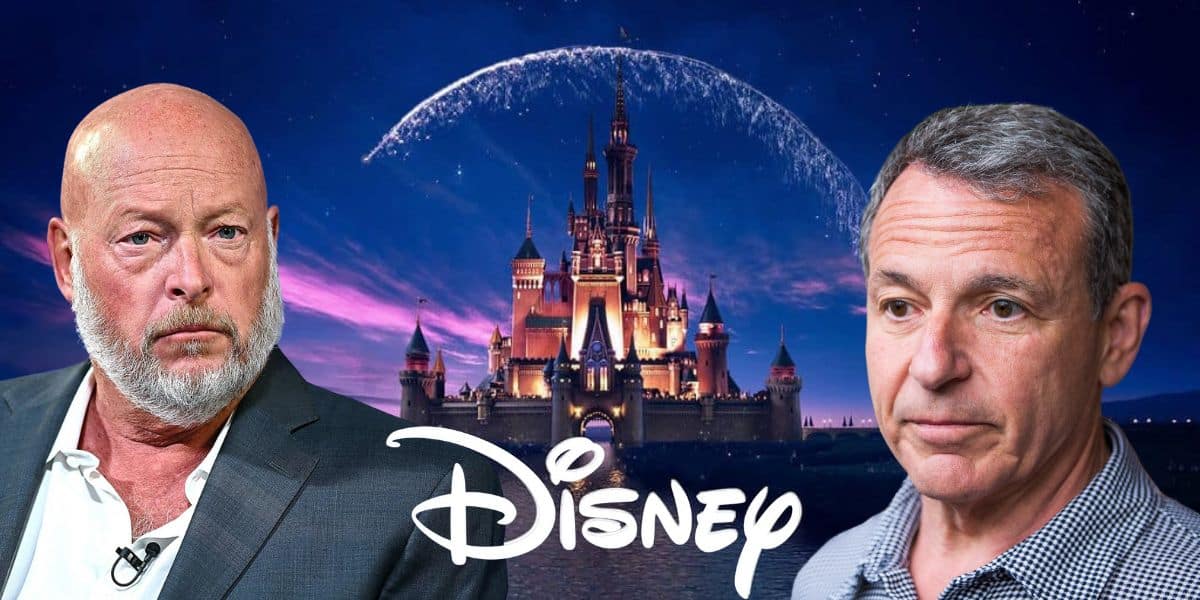 Disney Ceo Bob Chapek Replacement Bob Iger and Bob Chapek stand together at a Disney corporate event, with Iger handing over a document to Chapek.