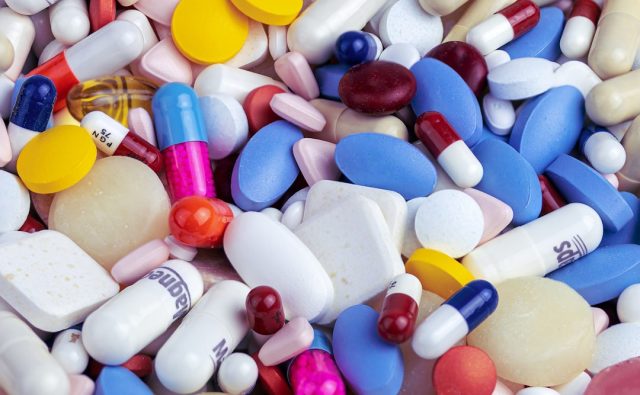 Israeli researchers propose blood pressure drug Losartan as potential COVID-19 treatment Researchers in a lab discussing a blood pressure drug as a potential treatment for COVID-19.