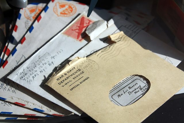 Former postman in Japan charged for hoarding 24,000 pieces of mail Stacks of undelivered mail bags seized by police inside a Japanese apartment, with officers cataloging envelopes.