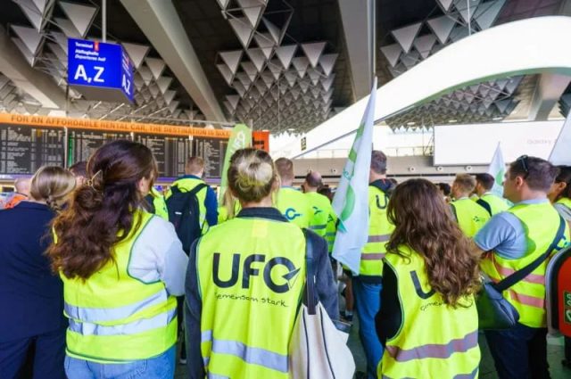 Lufthansa Ufo Union Strike Threat Lufthansa aircraft parked at an airport terminal as cabin crew union UFO threatens renewed strikes after failed negotiations.