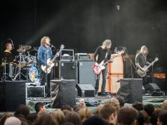 Mastodon Removes Brent Hinds After 24-Year Run Mastodon onstage in a packed venue, one guitar microphone stand suddenly empty after Brent Hinds' removal.