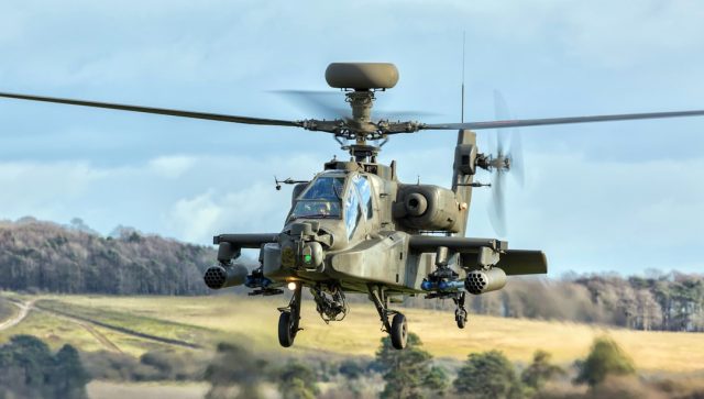 Helicopter Hits Power Lines in Northern Afghanistan, Killing Two Remote mountainous terrain in Samangan Province, Afghanistan, where power lines cross rugged landscape near a helicopter crash site.