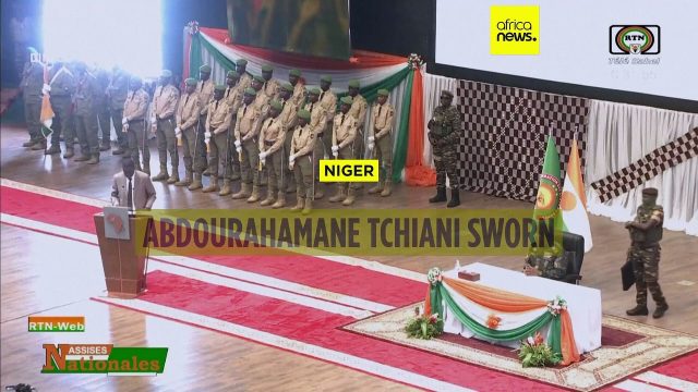 Mohamed Bazoum Soldiers in military uniform stand guard near a government building in Niamey, Niger, following the detention of President Mohamed Bazoum.