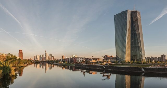 Pierre Wunsch European Central Bank headquarters in Frankfurt, with euro currency symbols visible on the building facade.