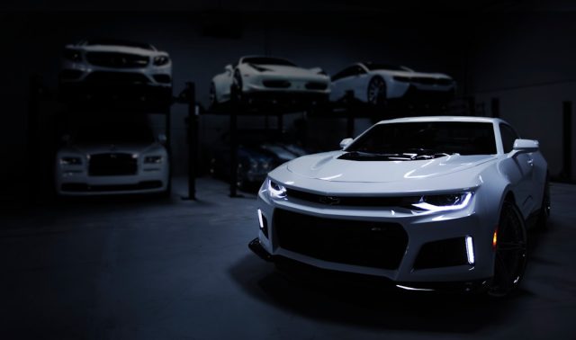 Toyota recall expands to 3.2 million vehicles as fuel pump defect persists A Toyota Camry on a highway with instrument panel warning lights illuminated before a potential stall