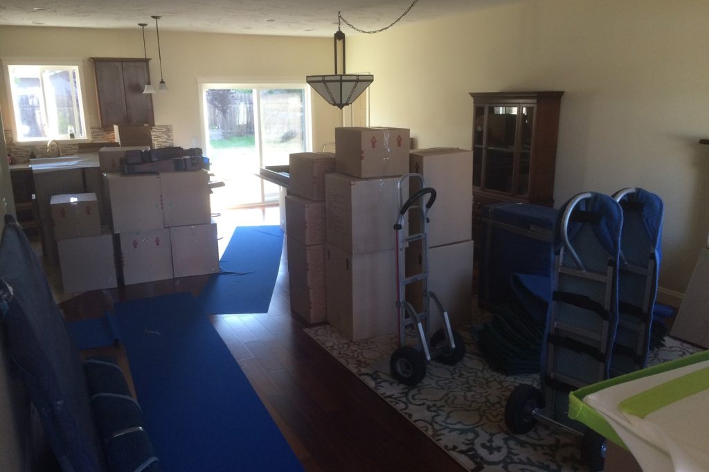 Moving with Kids: Donated Clothes Become Unwanted Moving Problem