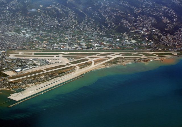 Israeli Strikes in Beirut Leave Three Dead and Six Injured Smoke rises near Beirut-Rafic Hariri International Airport after Israeli airstrikes hit the road leading to the terminal.